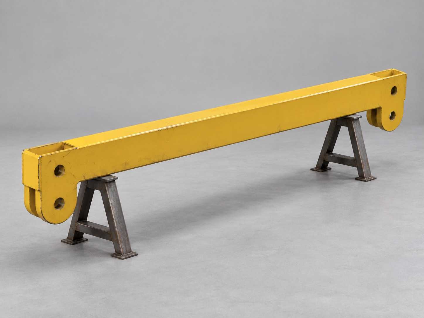 Spreader bar amarela com pares de olhais nas pontas (imagem ilustrativa)